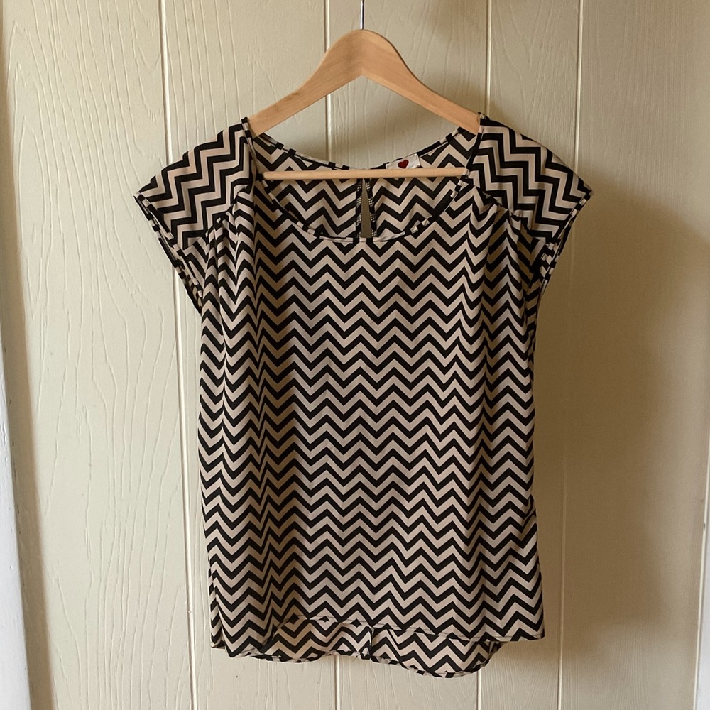 Tan and black blouse, size medium.
